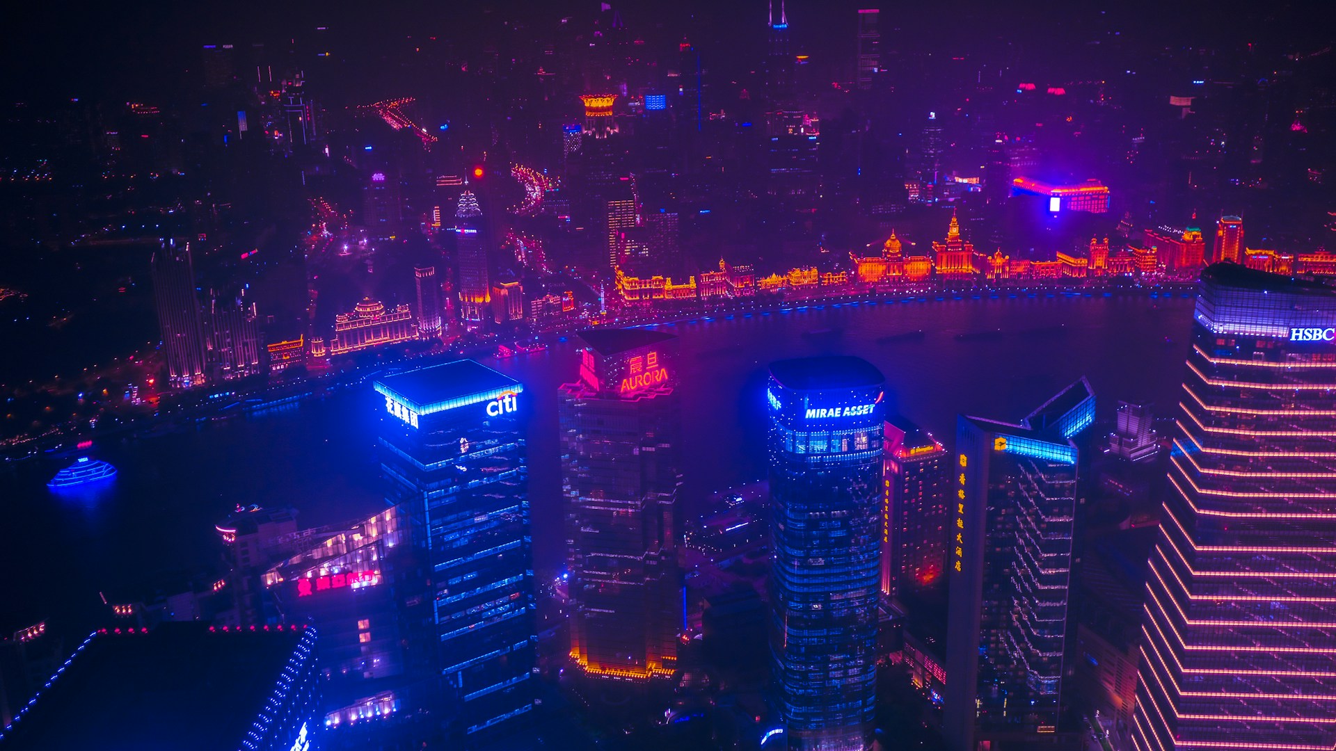 Shanghai at night, edited to give its buildings lighting a neon look.